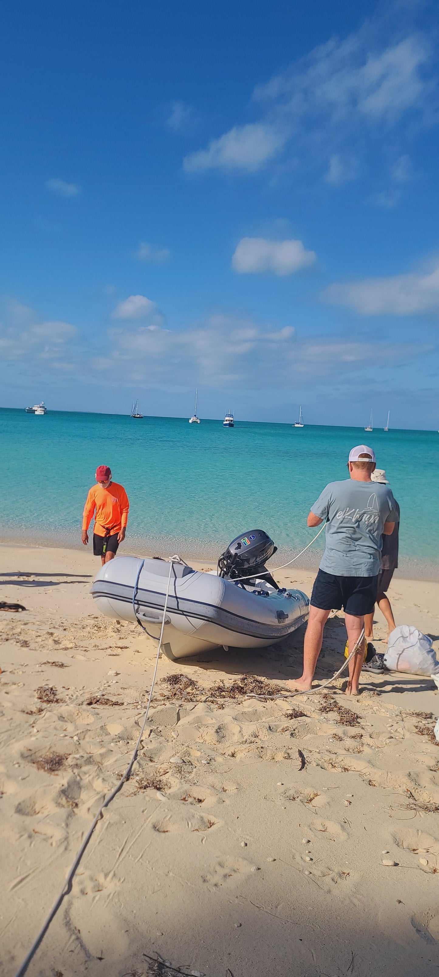 Dinghy with anchor tied