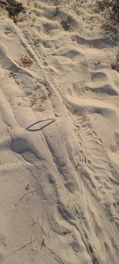 Mantus anchor burried under the sand